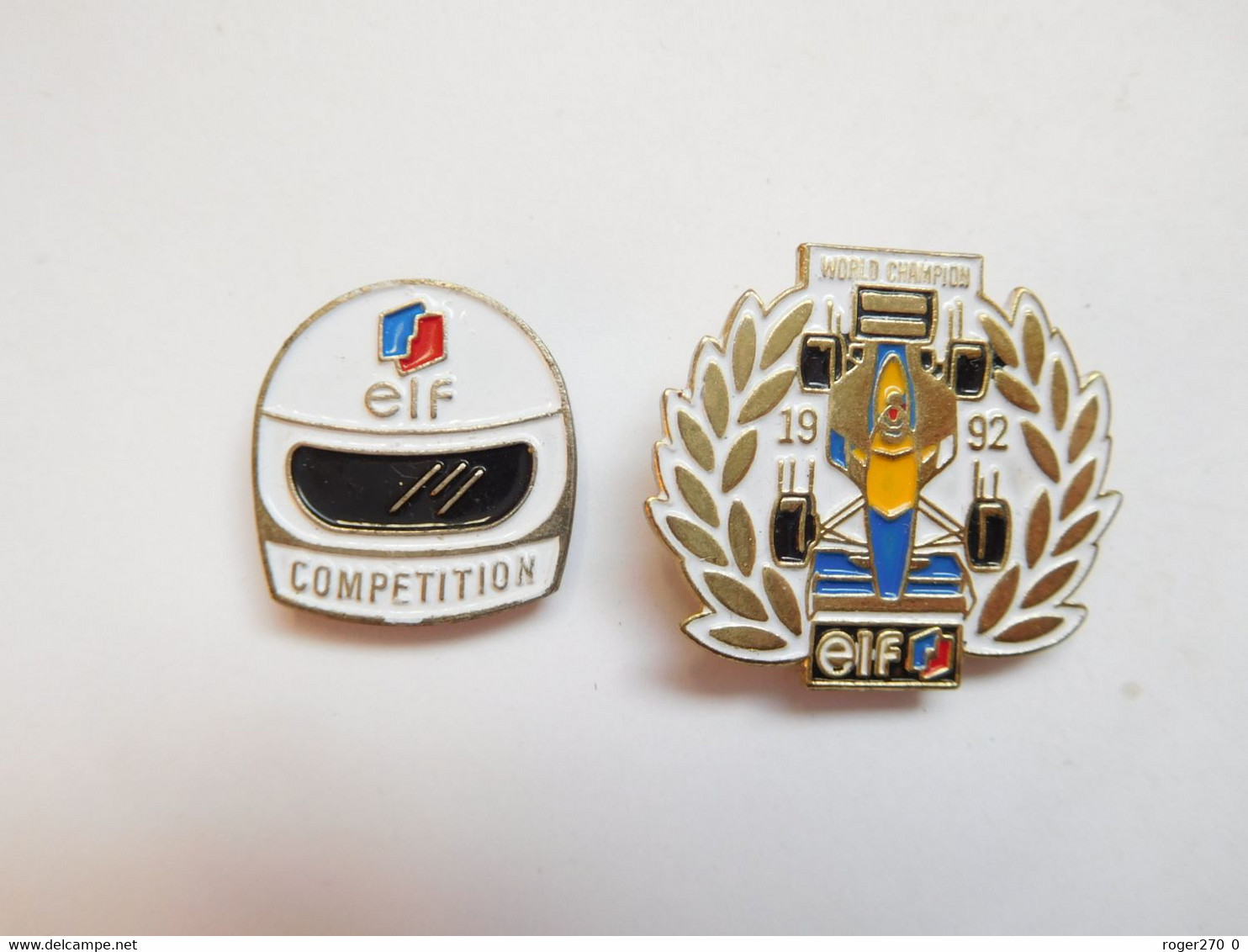 2 Pin's , Auto F1 , ELF ,  Casque & F1 Renault World Champion - F1