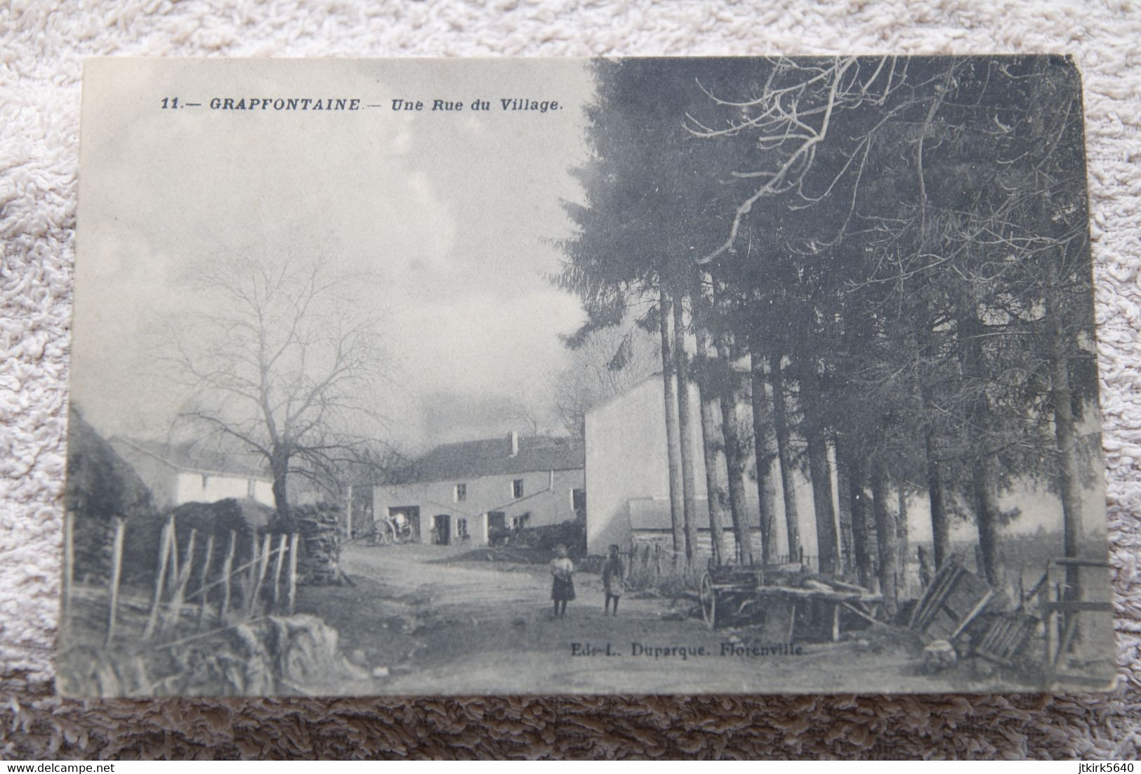 Grapfontaine "Une Rue Du Village" - Neufchateau