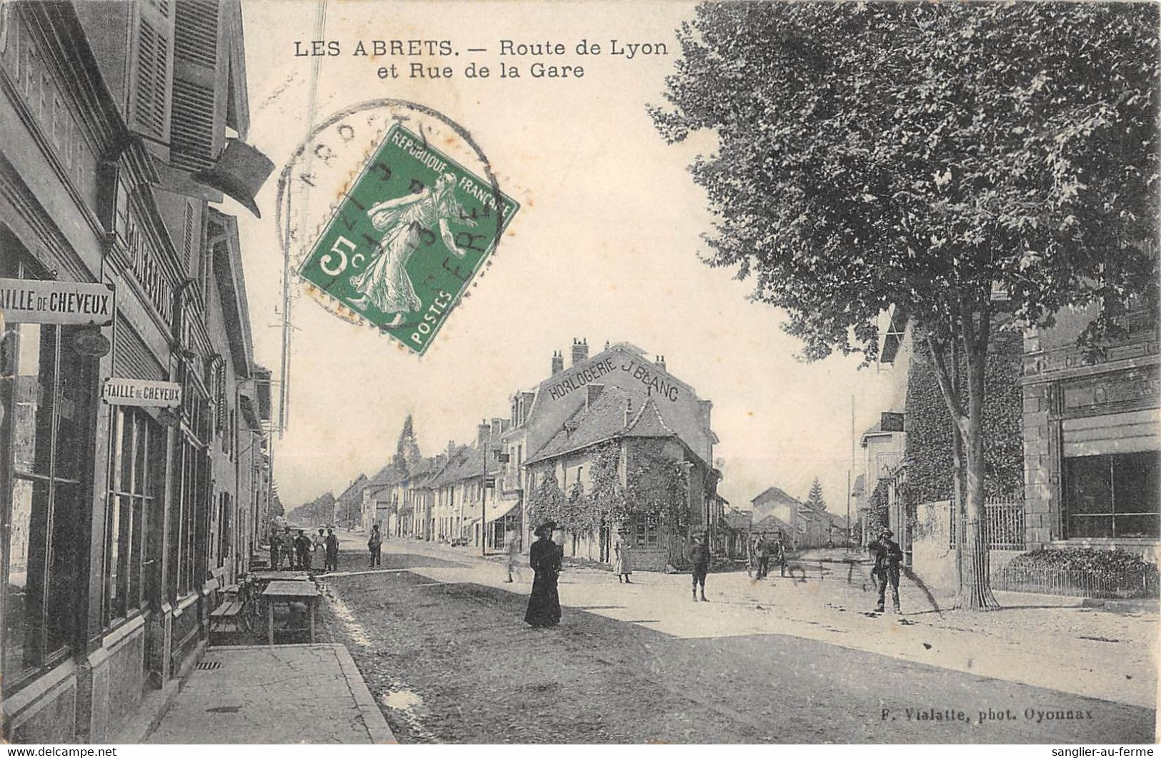 CPA 38 LES ABRETS ROUTE DE LYON ET RUE DE LA GARE - Altri & Non Classificati