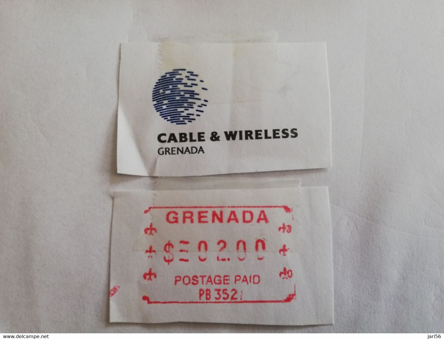 GRENADA  $ 20,- CHIP CARD POINTSETTIA/ C&W CARIBBEAN GENERAL CARD   /MINT IN WRAPPER  (RRRR)         **9495** - Grenada