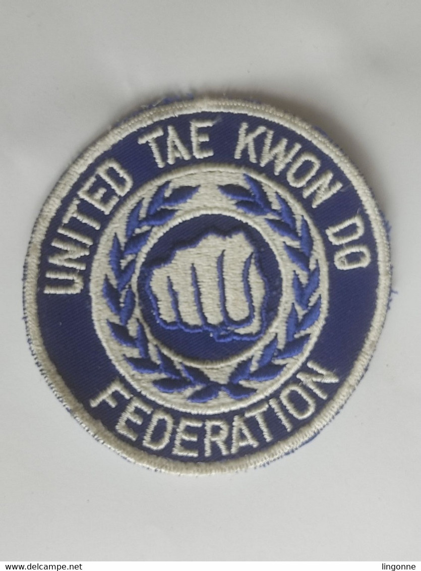 Ecusson TISSU FEDERATION UNITED TAEKWONDO  Diamètre 10 Cm Env - Arti Martiali