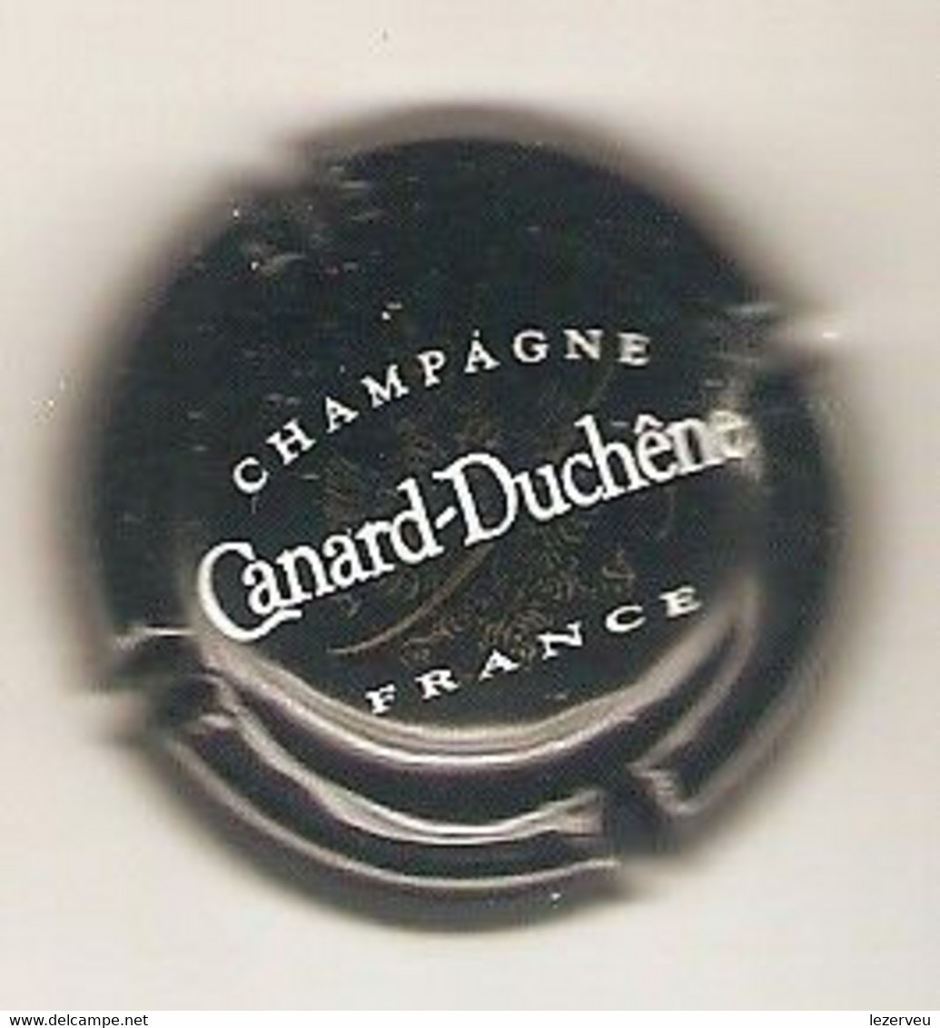 CAPSULE DE MUSELET CHAMPAGNE CANARD DUCHENE (blanc Et Or SuR NOIR CONTOUR NOIR) MENTION FRANCE - Canard Duchêne