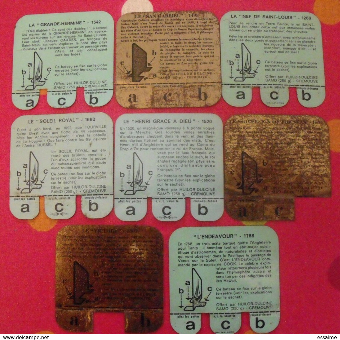 Lot De 8 Plaquettes Bateaux. Huilor Samo Chat Ambré Cremolive. Lot 10 - Plaques En Tôle (après 1960)