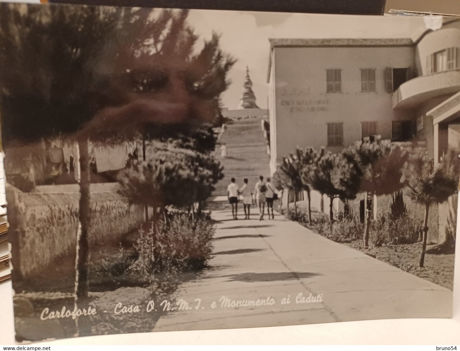 Cartolina Carloforte  Prov Carbonia Iglesias ,casa OMNI E Monumento Ai Caduti - Carbonia