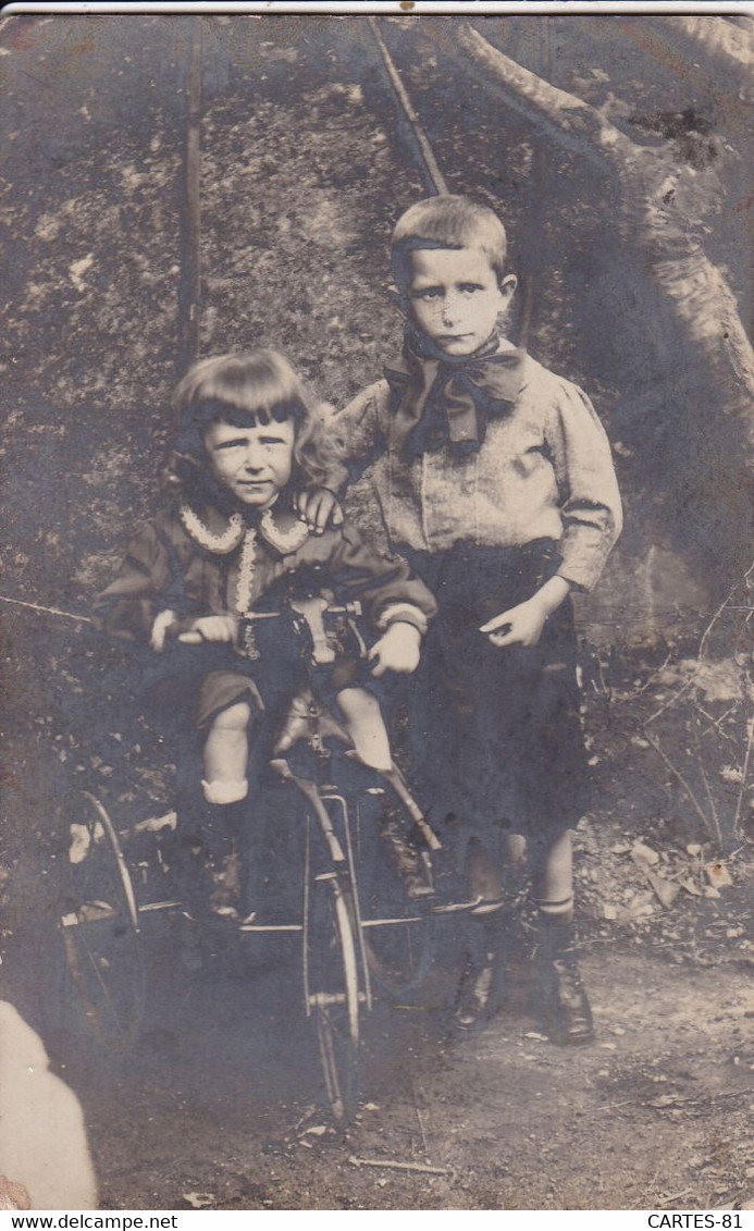 CPA/025    Enfants Tricycle - Da Identificare