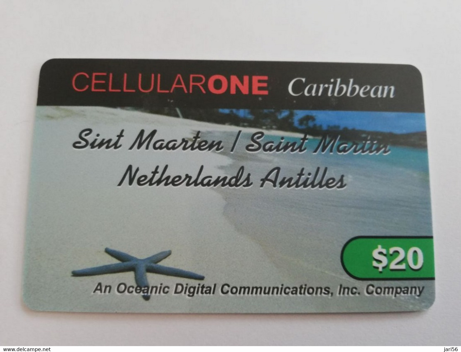 St MAARTEN  Prepaid  $20,- PARADISE WIRELESS  SEASTAR ON BEACH        Fine Used Card  **10128** - Antilles (Neérlandaises)