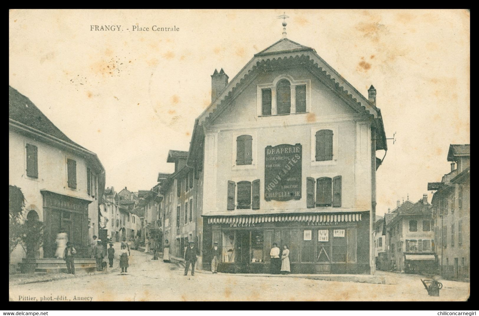 FRANGY - Place Centrale - Draperie Chapellerie - Animée - Edit. Photo PITTIER - Oblit. Perlée 1906 - Frangy