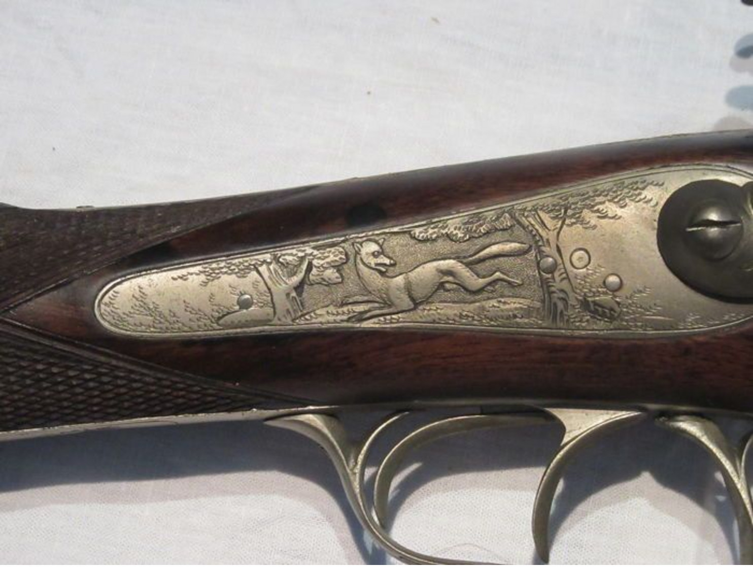 Beautiful pin fire rifle engraved with scene of hunting and animals