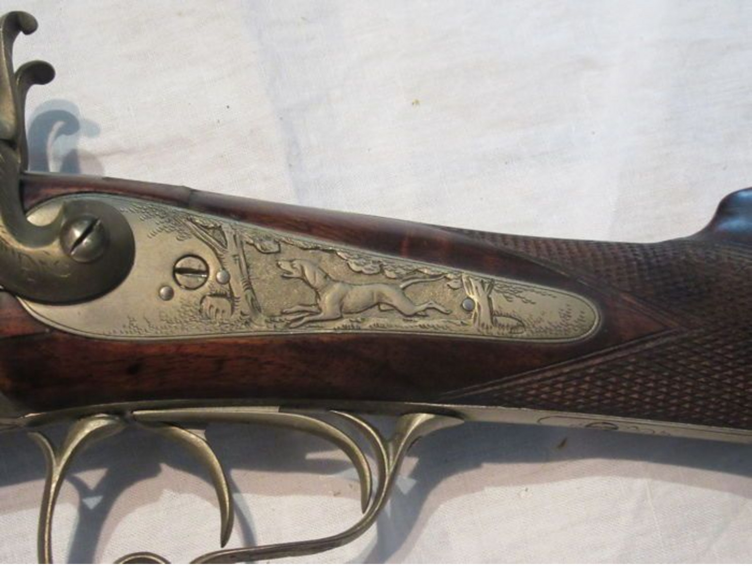 Beautiful pin fire rifle engraved with scene of hunting and animals