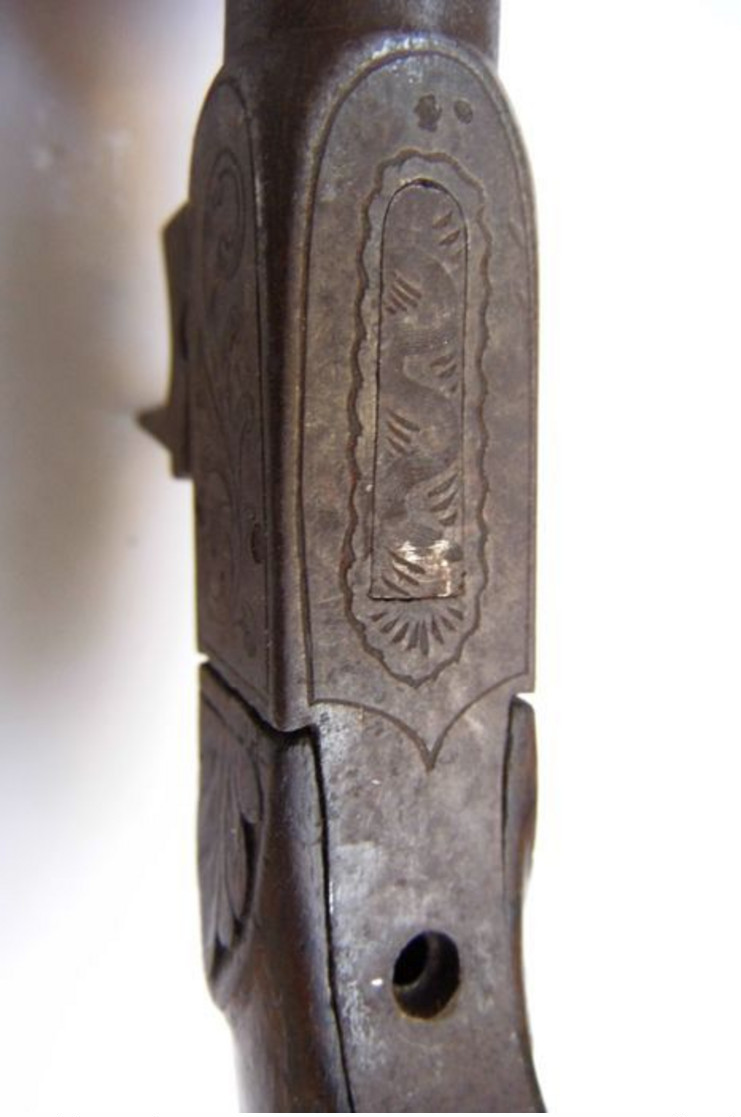 Percussion pistol, chest or punch. Renaissance butt. Damask barrel with four stripes. beginning 1800