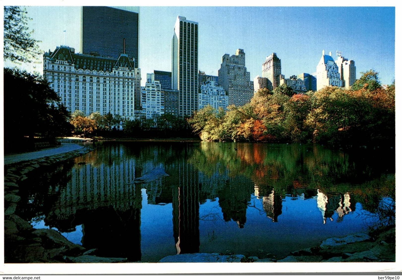 USA SOME OF NEW YORK'S FINEST HOTELS ARE MIRRORED ON CENTRAL PARK'S FABULOUS LAKE - Central Park