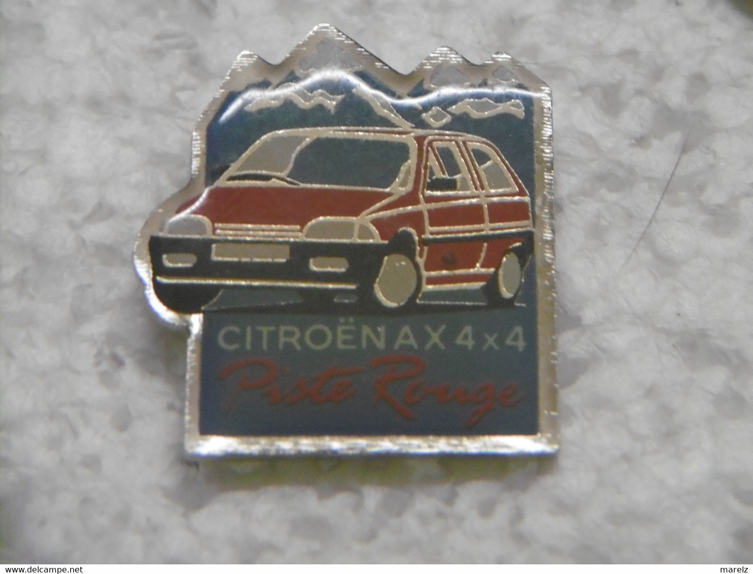 Pin's Automobiles - CITROËN AX 4X4 LA PISTE ROUGE - Pins Automobile - Pin Montagnes - Citroën