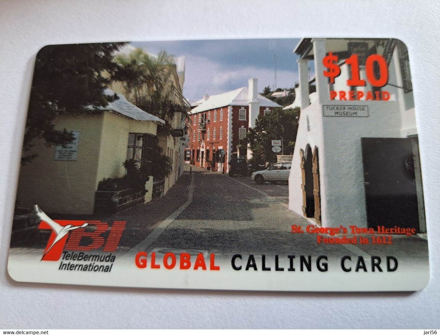 BERMUDA  $10 $ IN RED   -  BERMUDA  STREET SCENE       PREPAID CARD  Fine USED  TBI TELEBERMUDA INTERNATIONAL **10274** - Bermude