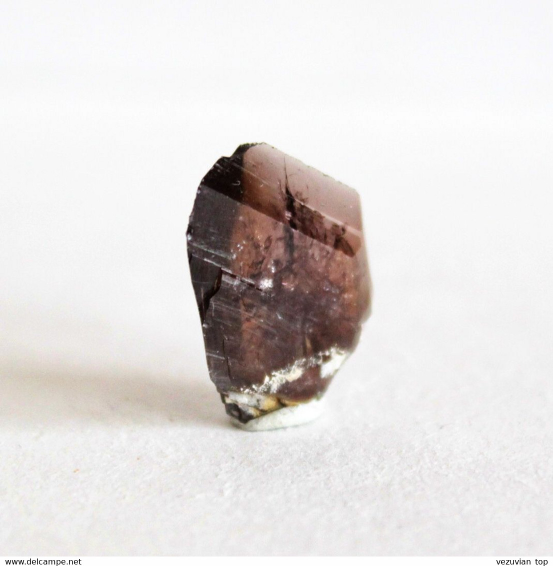Axinite-(Fe) crystal