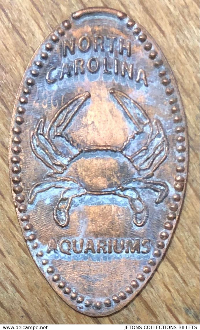 ÉTATS-UNIS USA NORTH CAROLINA AQUARIUMS CRABE PIÈCE ÉCRASÉE PENNY ELONGATED COIN MEDAILLE TOURISTIQUE MEDALS TOKENS - Monete Allungate (penny Souvenirs)