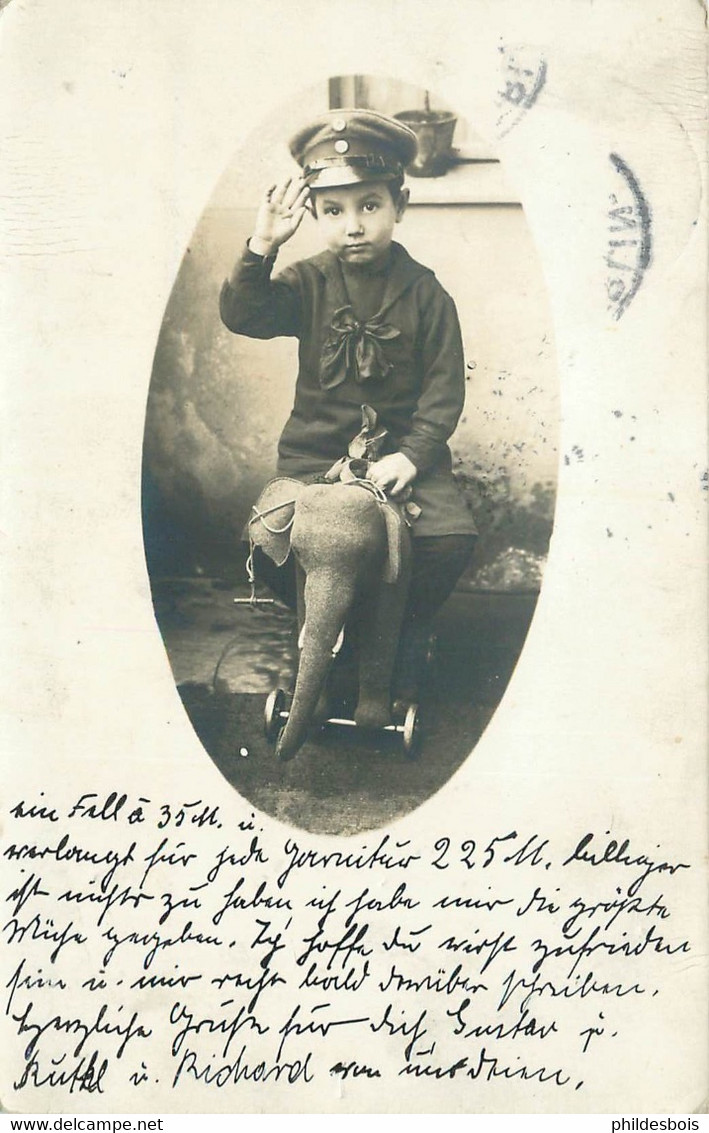 CARTE PHOTO  Enfant Sur Jouet Ancien  A Bascule Eléphant - Photographie