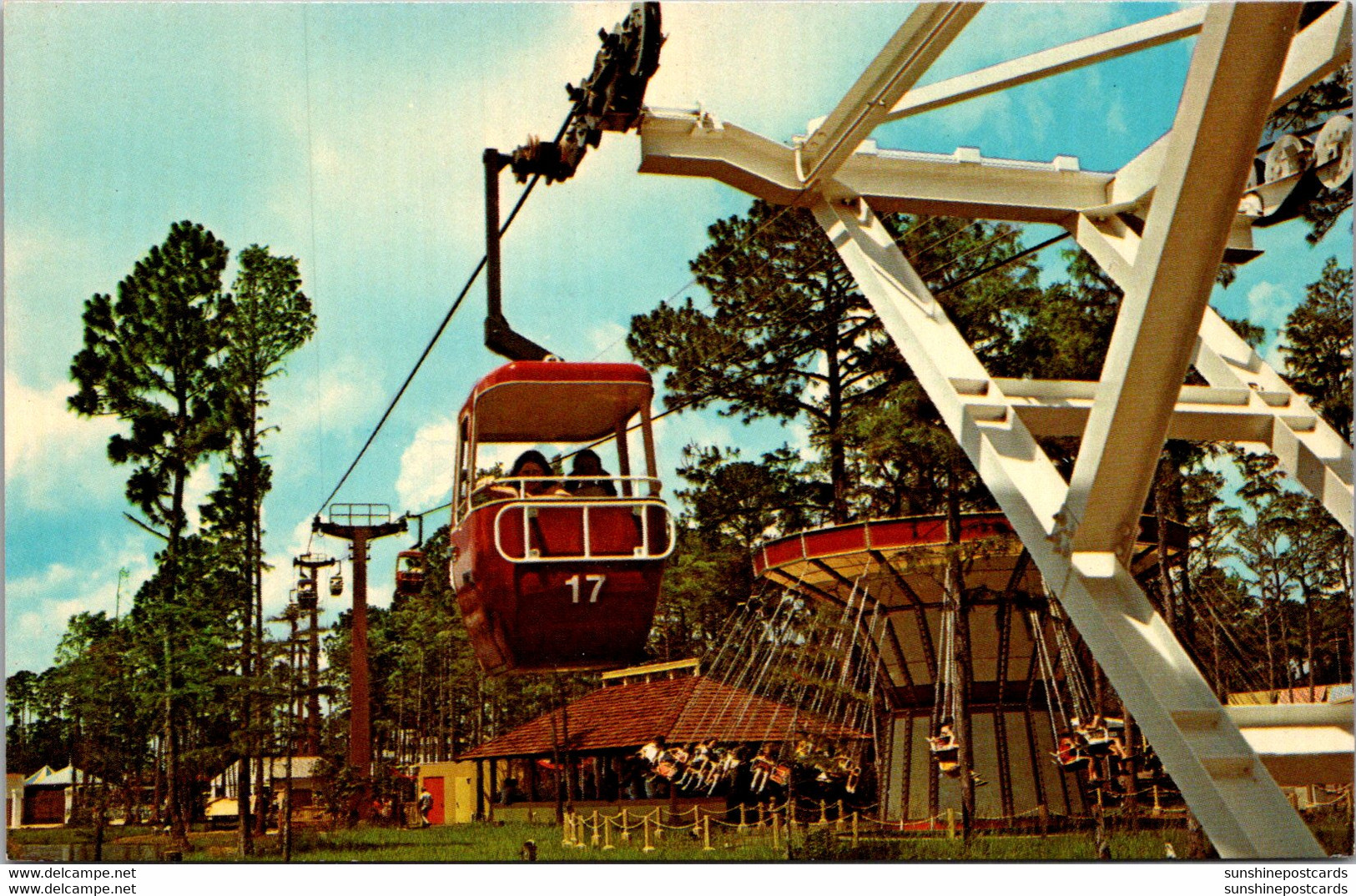 Florida Daytona Beach Marco Polo Park Sky Ride Arriving In India With Whirling Dervish In Background - Daytona