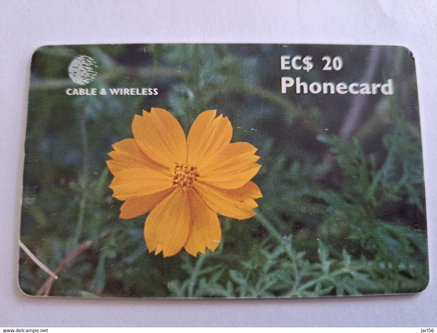 ANTIGUA  $20,- CHIPCARD FLOWER ORANGE COSMOS    Fine Used Card  ** 10534 ** - Antigua And Barbuda