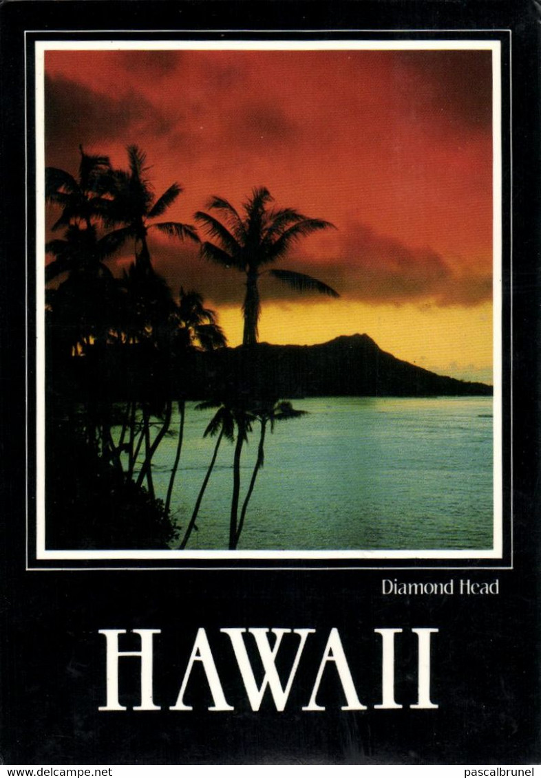 HONOLULU - A DRAMATIC SKY SILHOUETTES LEGENDARY DIAMOND HEAD , WAIKIKI'S NOTABLE LANDMARK - Honolulu