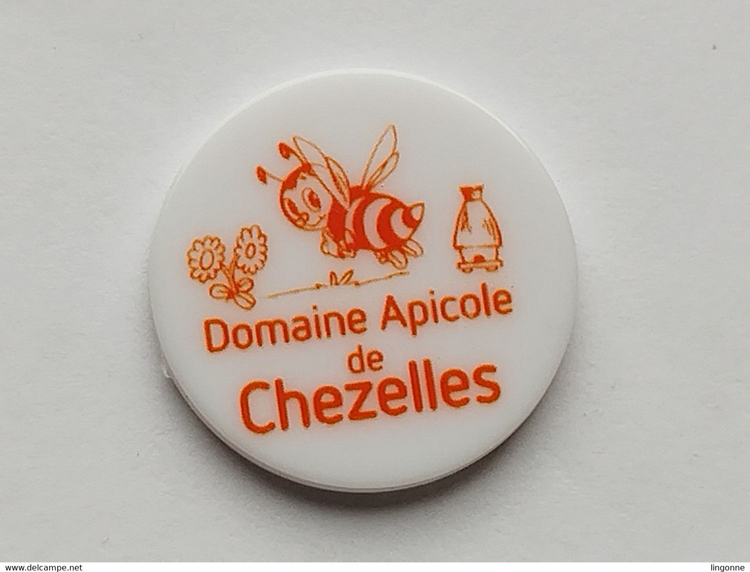 JETON De CADDIE Plastique DOMAINE APICOLE DE CHEZELLES (Indre 36) ORANGE - Jetons De Caddies