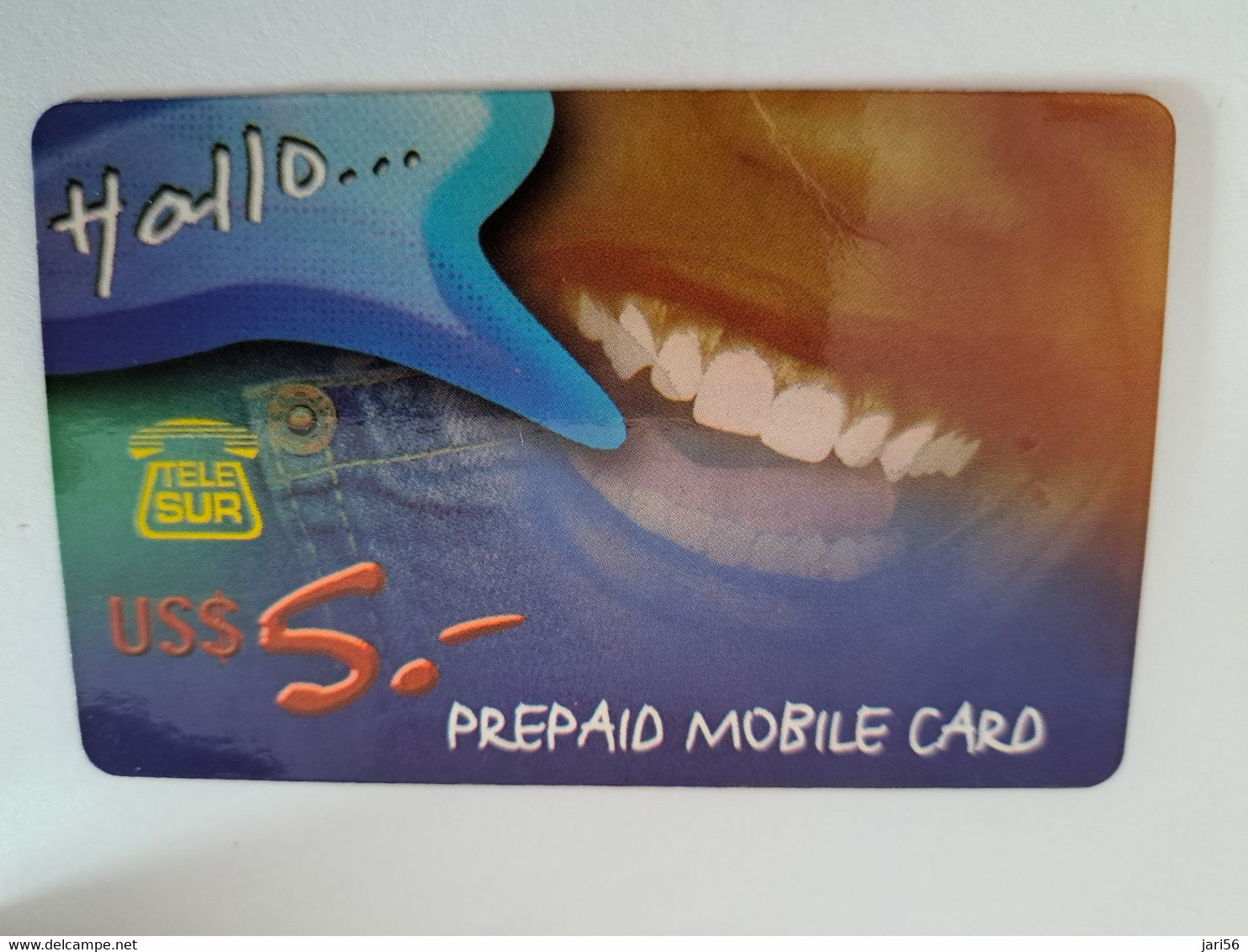 SURINAME US $ 5,-    PREPAID CALLING CARD   /  HALLO/MOUTH/TEETH           **10924** - Suriname