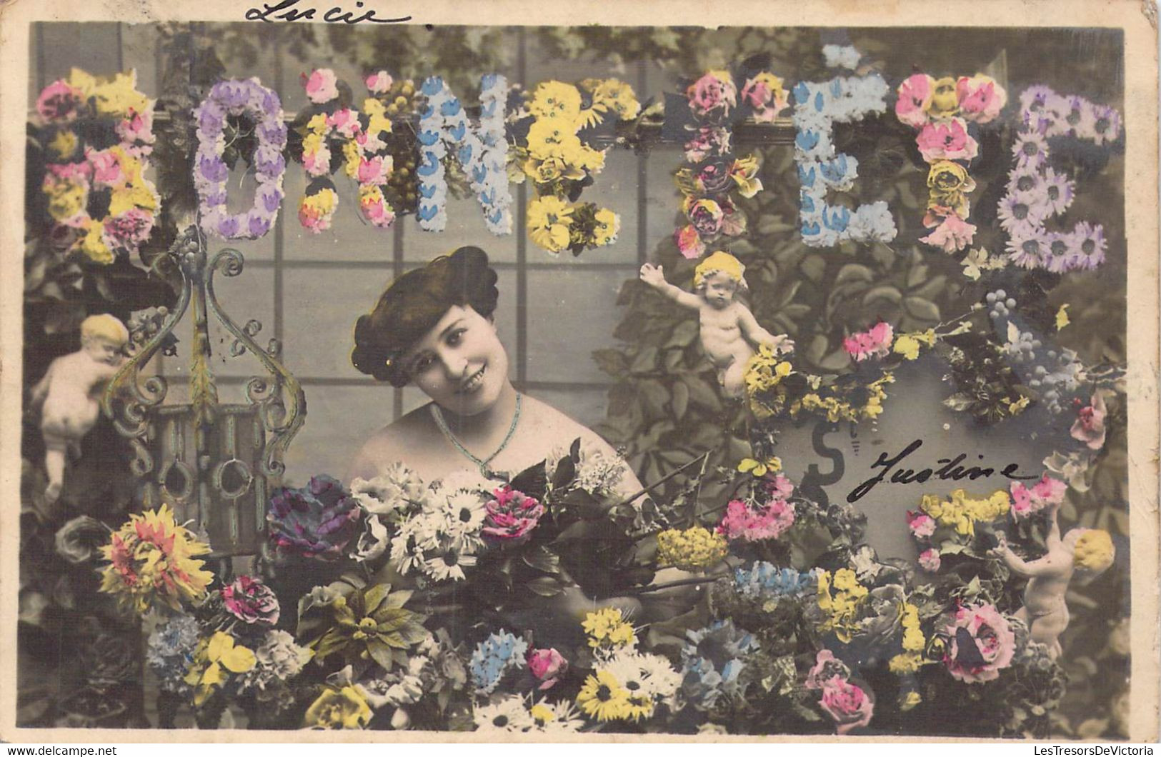 CPA - FETE VOEUX - Femme Souriante Parmi Des Milliers De Fleurs De Toutes Les Couleurs Ste Justine - Anges - Dos Non Div - Autres & Non Classés