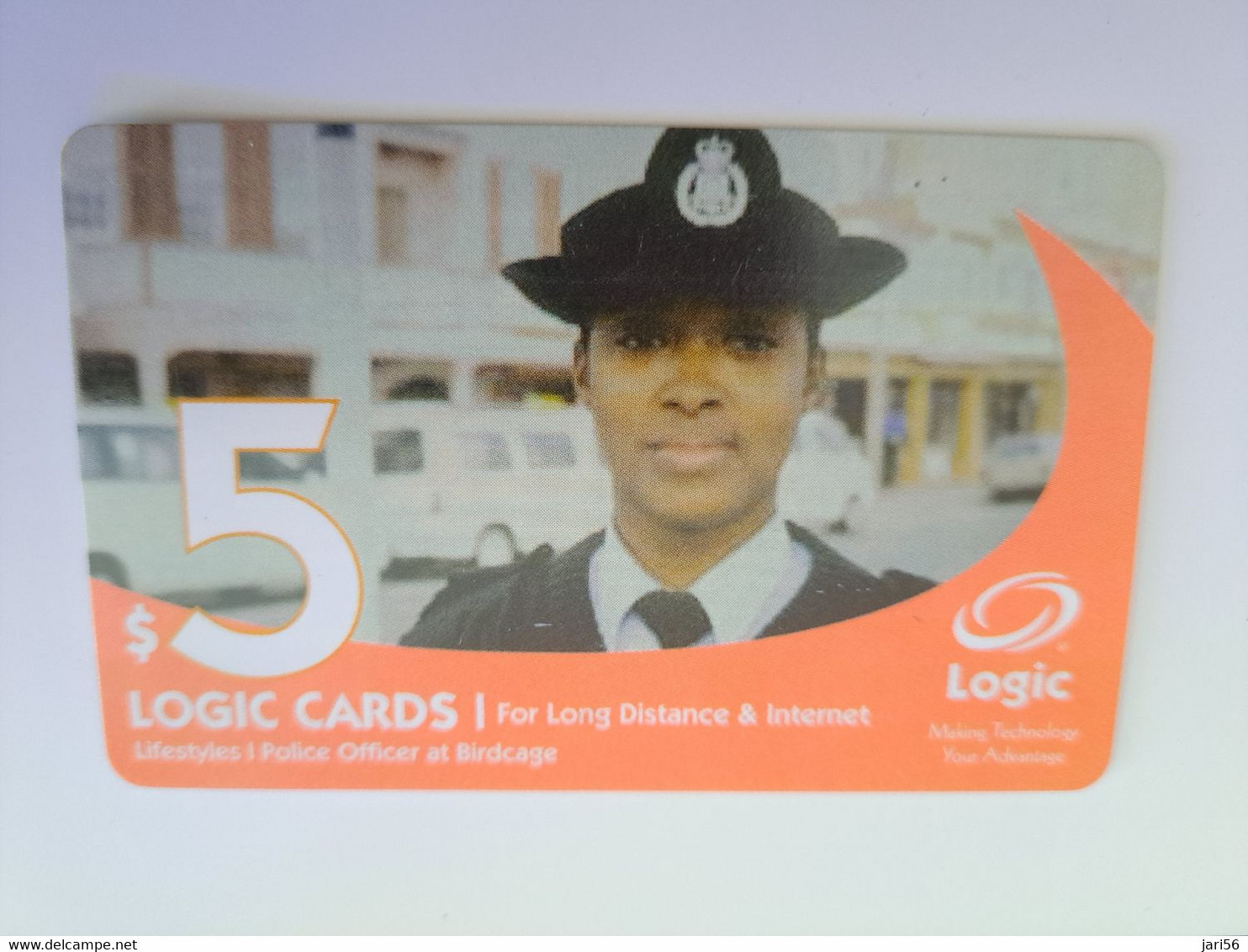 BERMUDA  $ 5,-  LOGIC/  POLICE LADY   IN BERMUDA / DATE 11 /2006 /   PREPAID CARD  Fine USED  **11301** - Bermudes