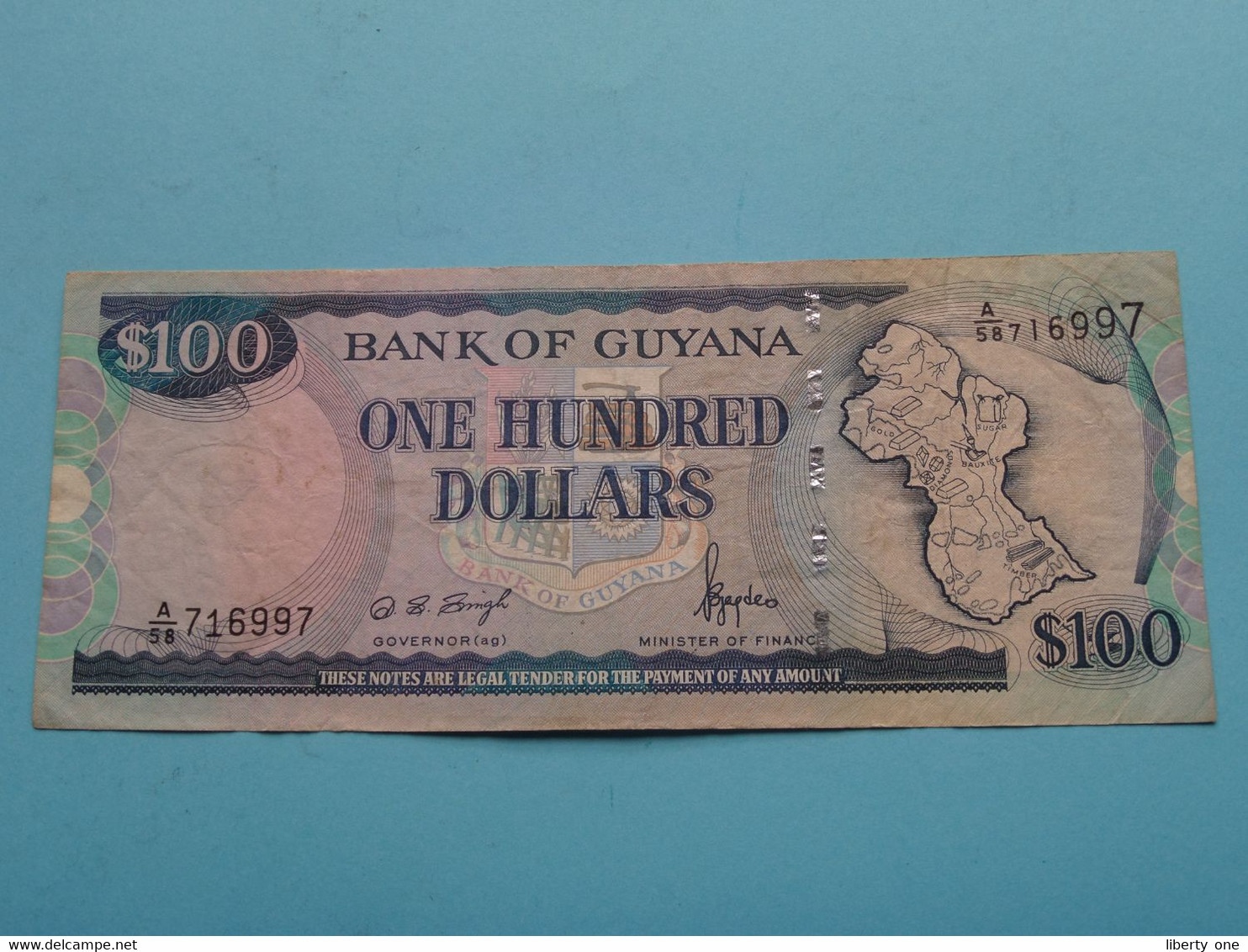 100 Dollars (A/58 716997 ) Bank Of GUYANA ( For Grade, Please See Photo ) Circulated ! - Guyana