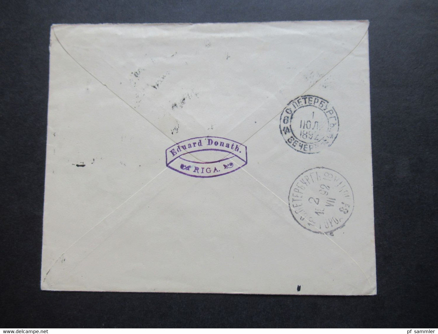 Russland / Lettland 1892 Ganzsachen Umschlag Mit Zusatzfrankatur Abs. Stempel Eduard Donath Riga - Lettres & Documents