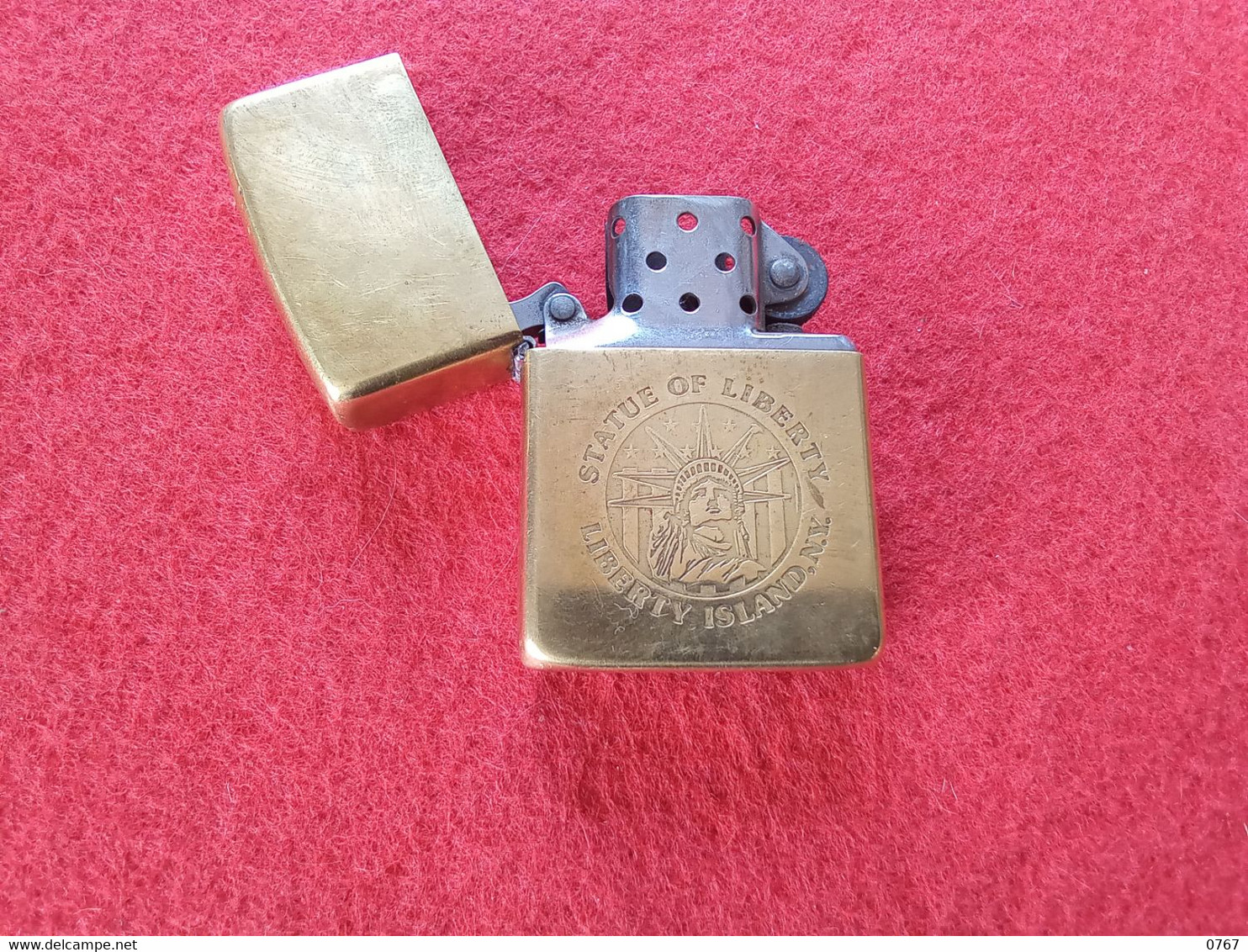 Briquet ZIPPO made in USA statue de la liberté liberty Islande NY NEW YORK 1932 1986 doré (basarcollect28)