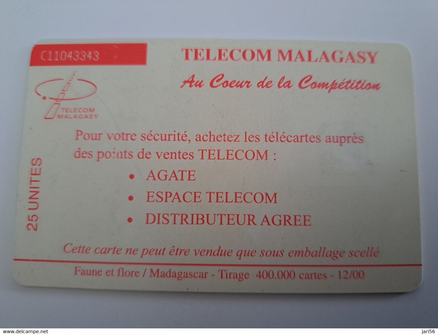 MADAGASCAR/MALAGACY CHIPCARD 25 UNITS / MAKI MONKEY/ FLOWERS DATE 12/00  USED CARD     ** 11919** - Madagascar