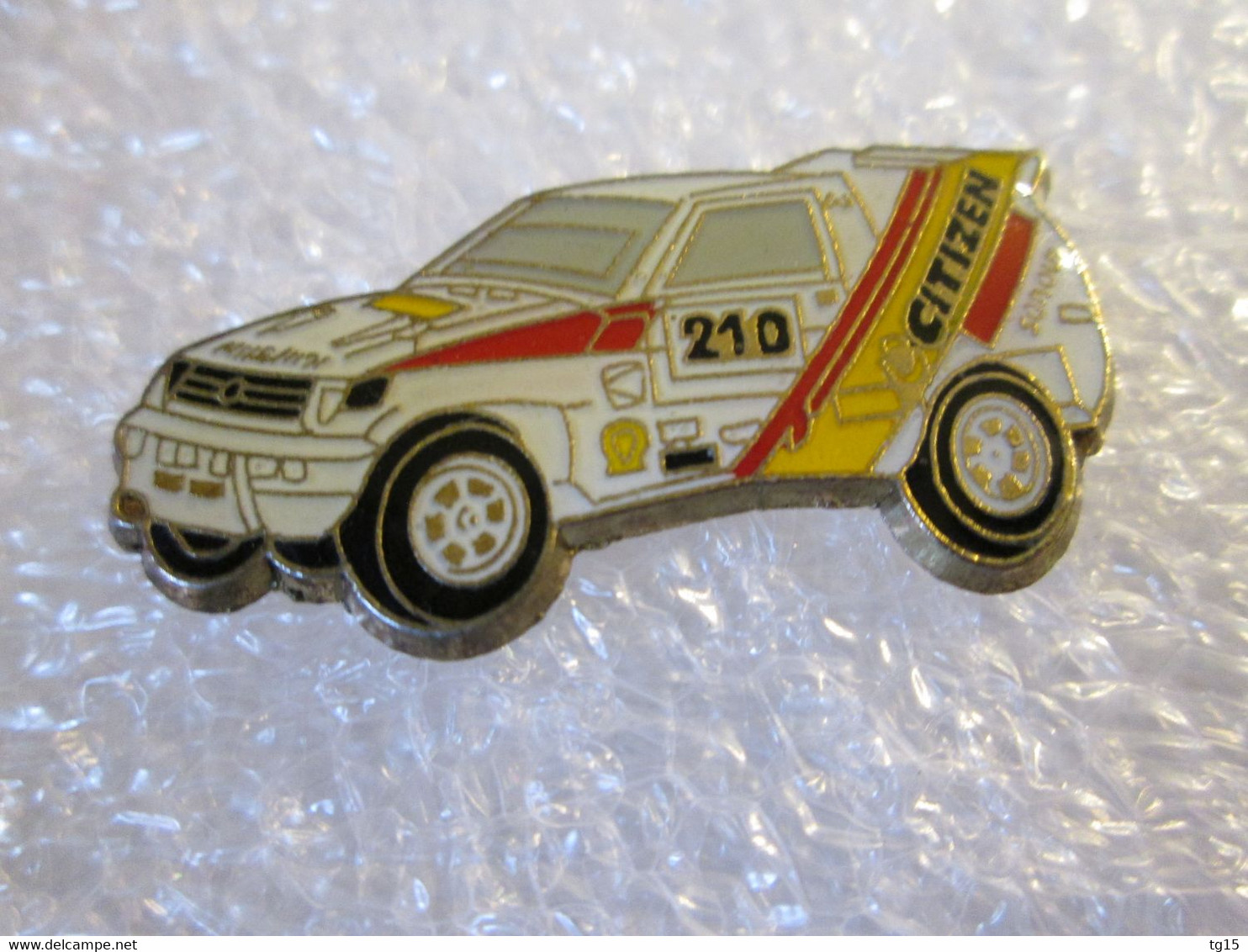 PIN'S    MITSUBISHI   PAJERO  SPORT RALLYE PARIS DAKAR  CITIZEN - Mitsubishi