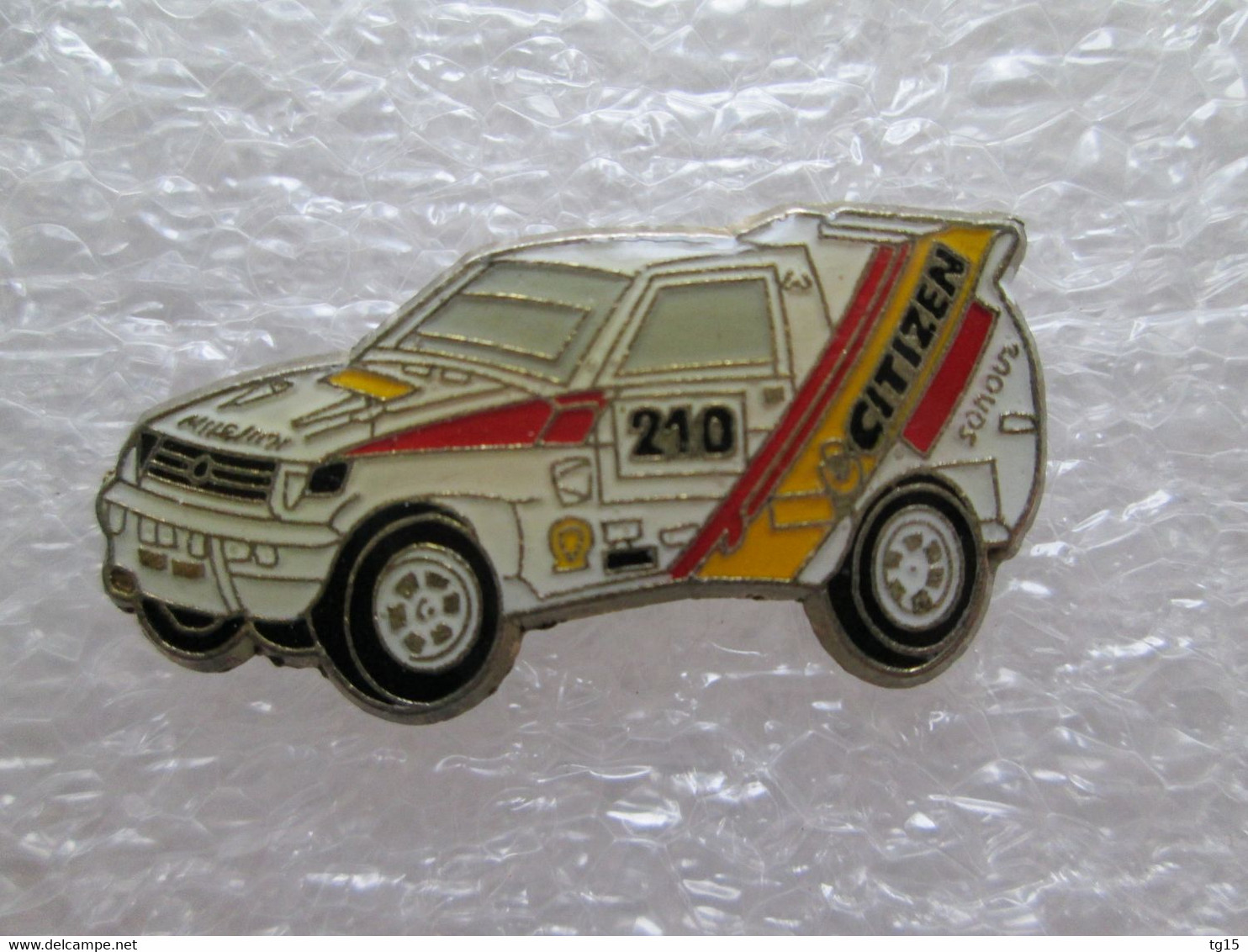 PIN'S    MITSUBISHI   PAJERO  SPORT RALLYE PARIS DAKAR  CITIZEN - Mitsubishi