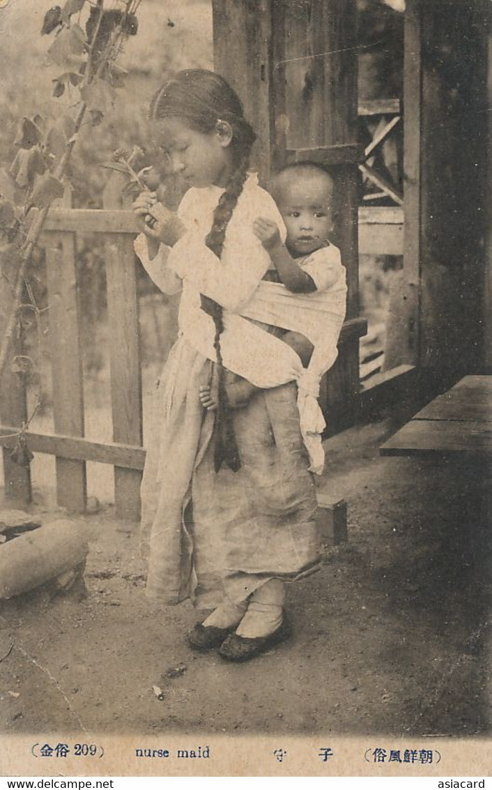 Nurse Maid Young Girl With Nice Plaid Holding Young Boy In Her Back - Korea (Noord)