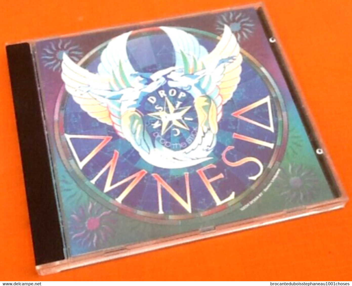 CD    Amnesia  Drop The Stick  (1990) - Dance, Techno En House