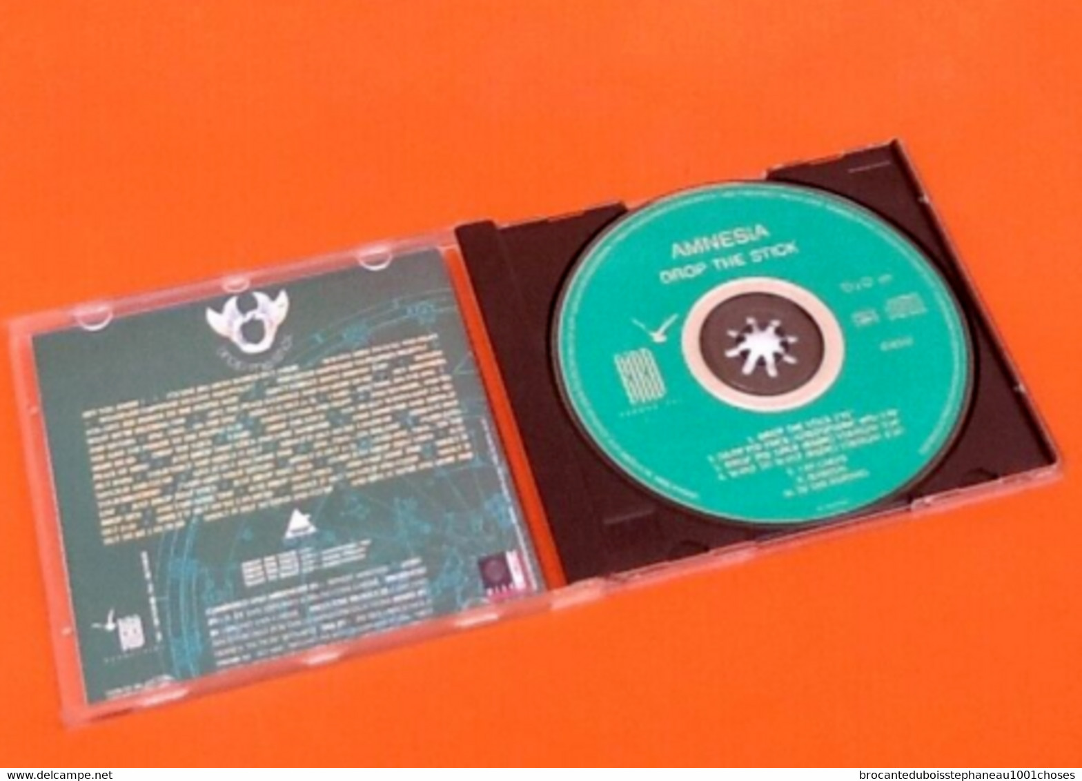 CD    Amnesia  Drop The Stick  (1990) - Dance, Techno En House