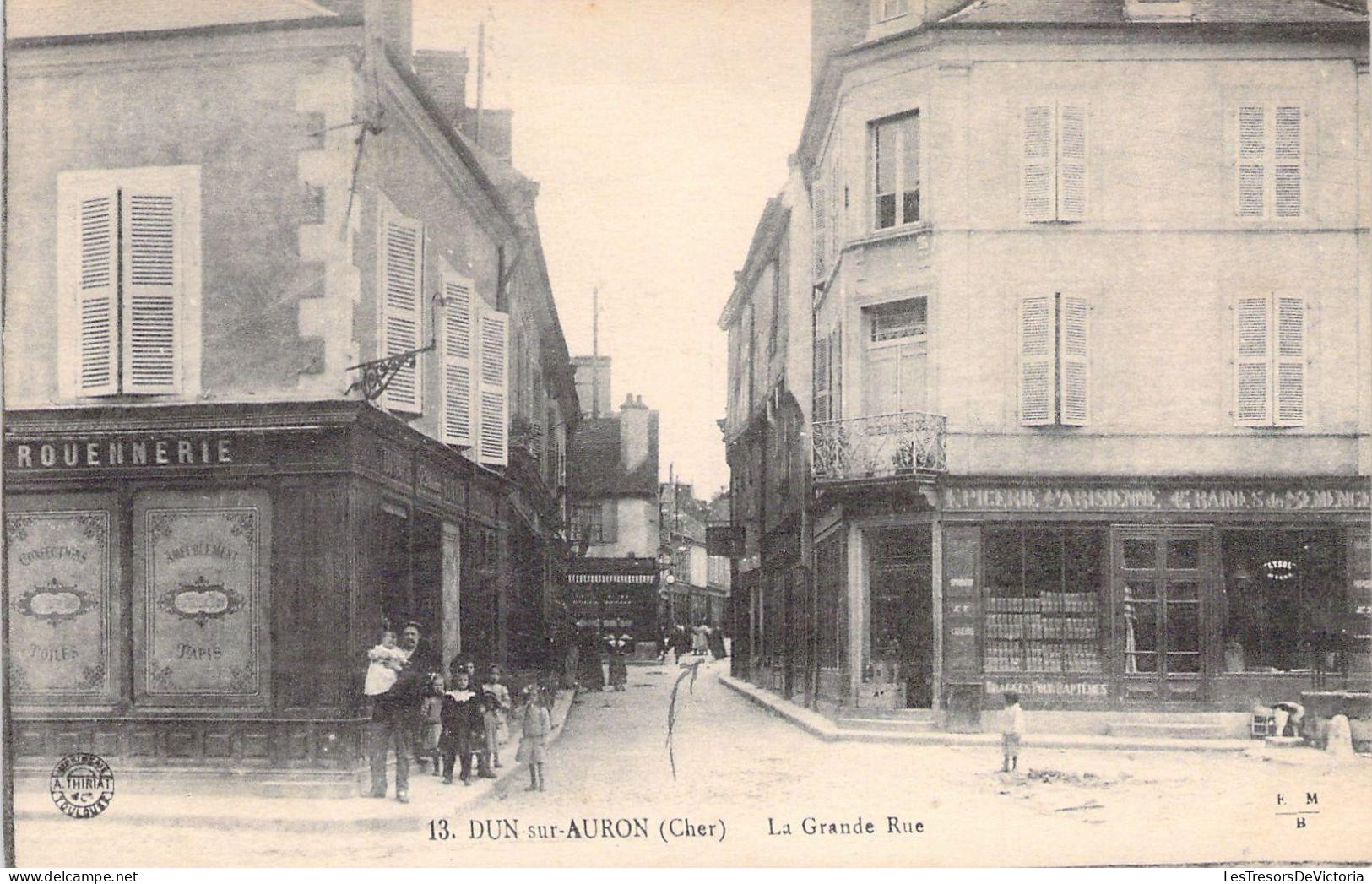 CPA - FRANCE - 18 - DUN SUR AURON - La Grande Rue - Animée - Epicerie - Dun-sur-Auron