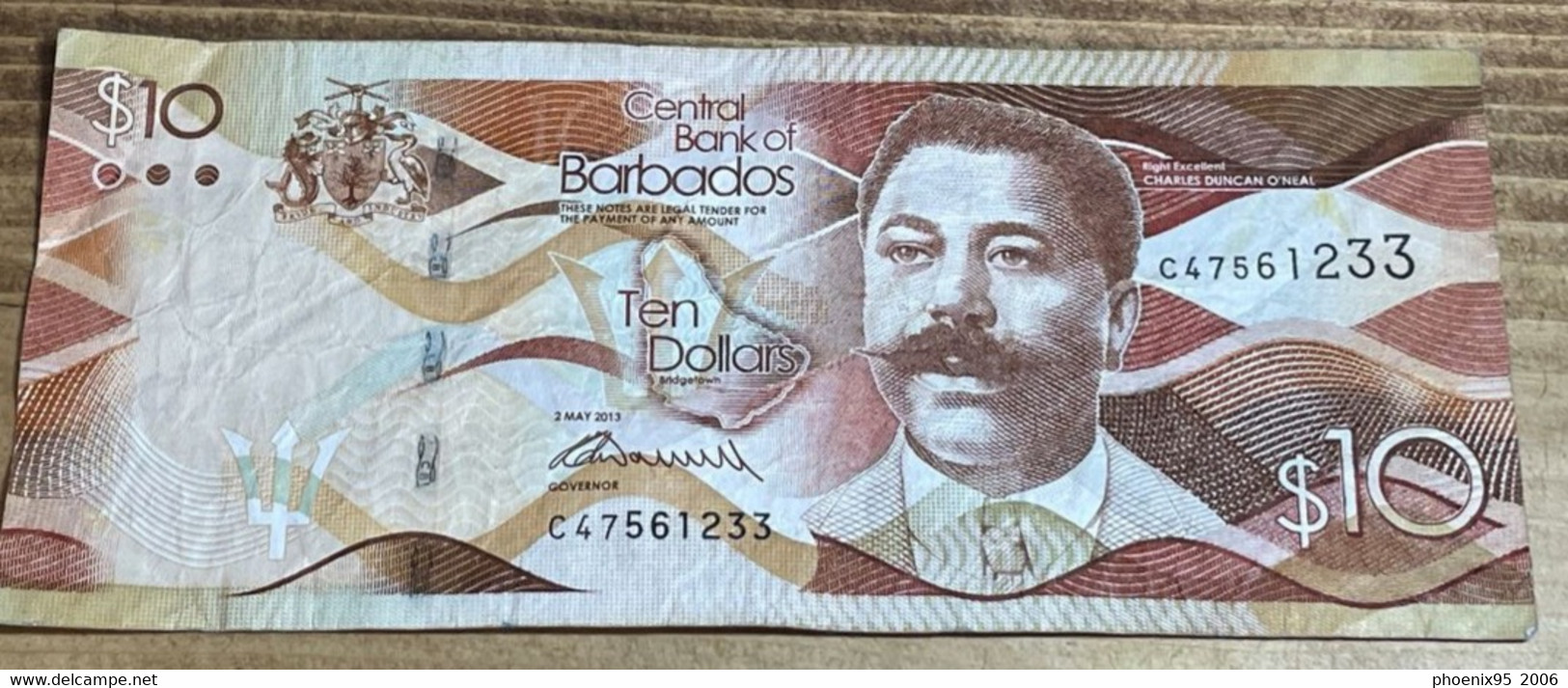 Barbados - Ten Dollar Bank Note. Average, Circulated Condition. - Barbades