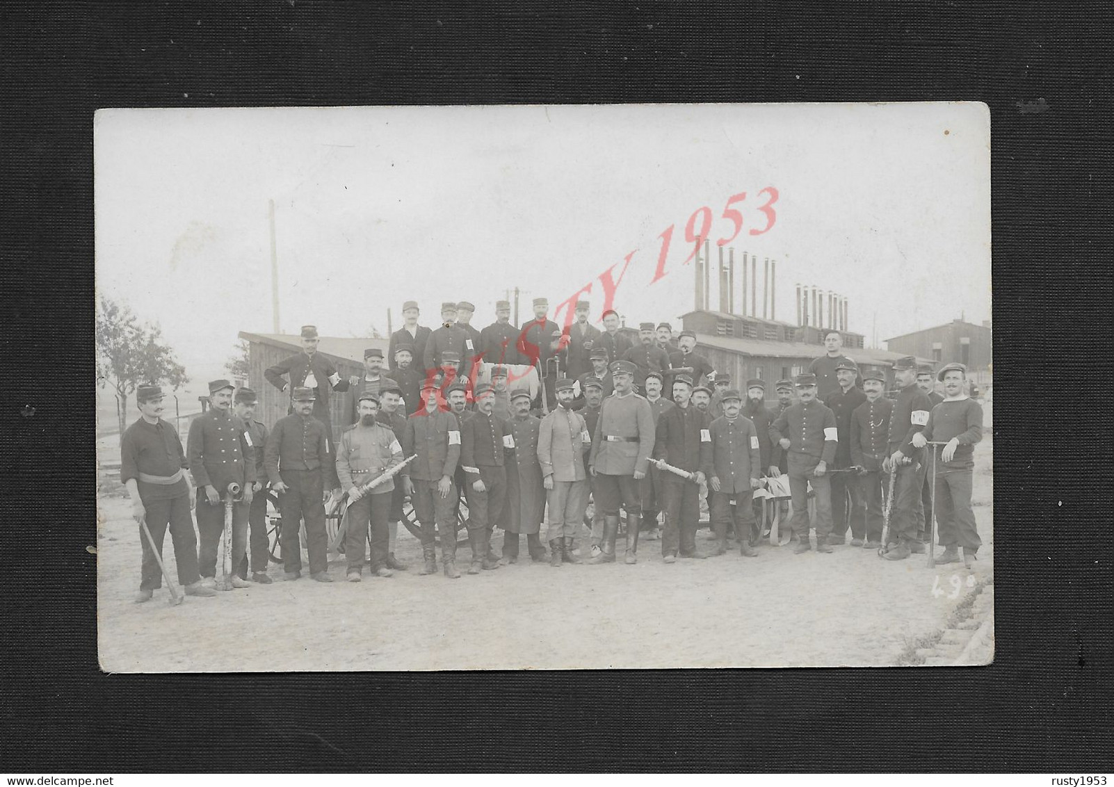 MILITARIA CARTE PHOTO MILITAIRE GROUPE DE SOLDATS PRISONNIERS POMPIER DE CASSEL ALLEMAGNE 15  À LUCIE BOURRET  ORANGE : - Pompiers