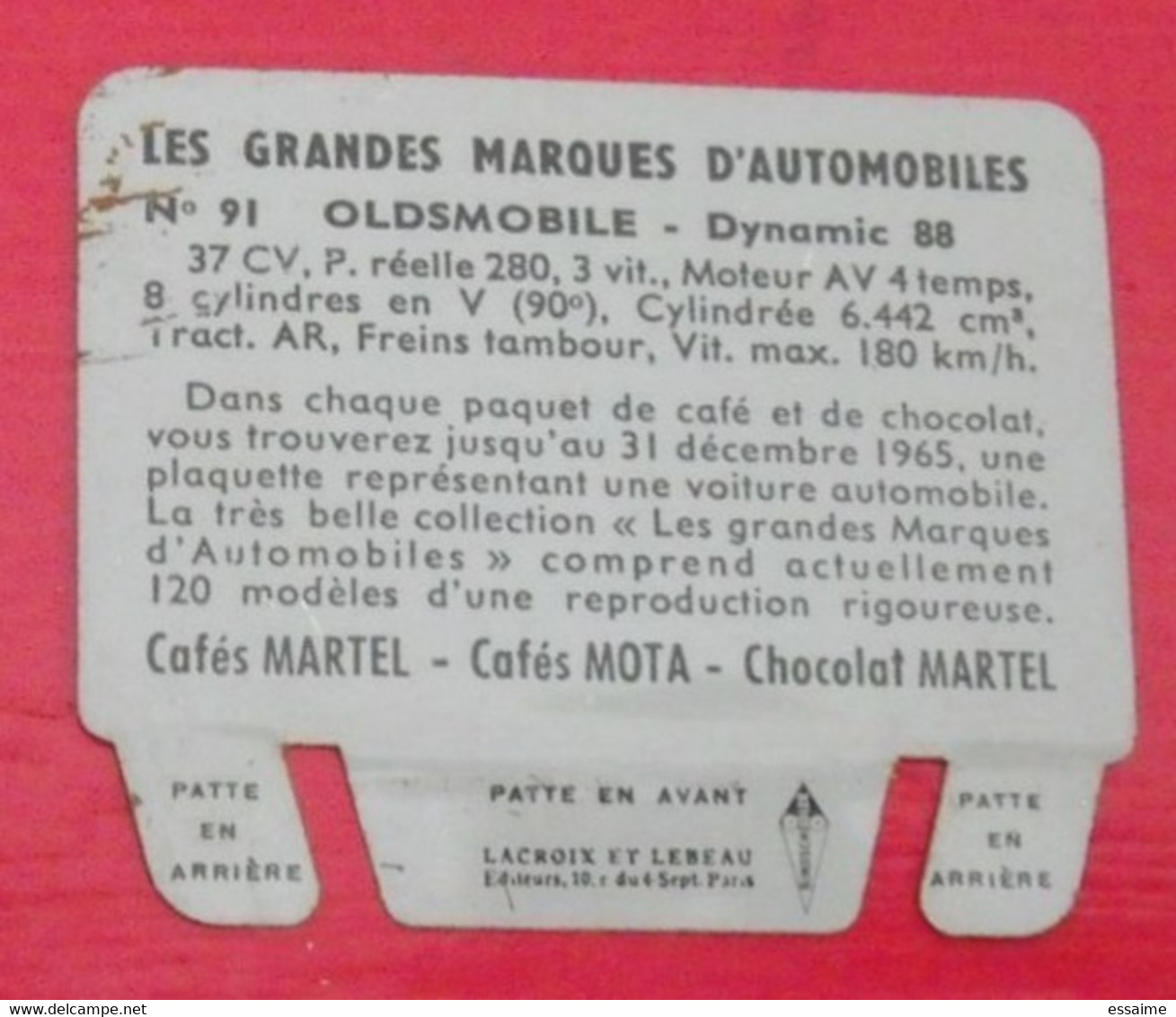 Plaque Oldsmobile N° 91. Les Grandes Marques D'automobiles. Chocolat Cafés Martel Mota. Plaquette Métal Vers 1960 - Placas En Aluminio (desde 1961)