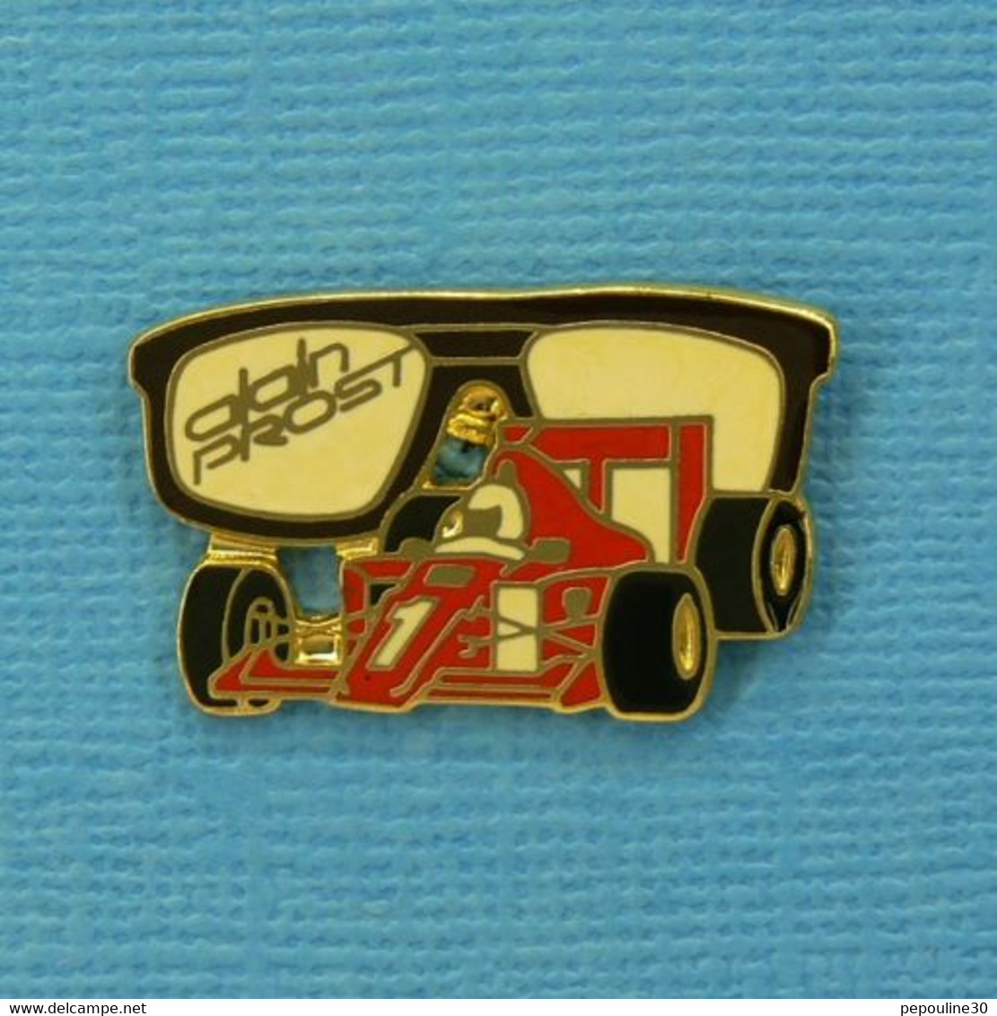 1 PIN'S //  ** FORMULE 1 / LUNETTE ALAIN PROST / NOIRE ** . (POUILLOUX) - F1