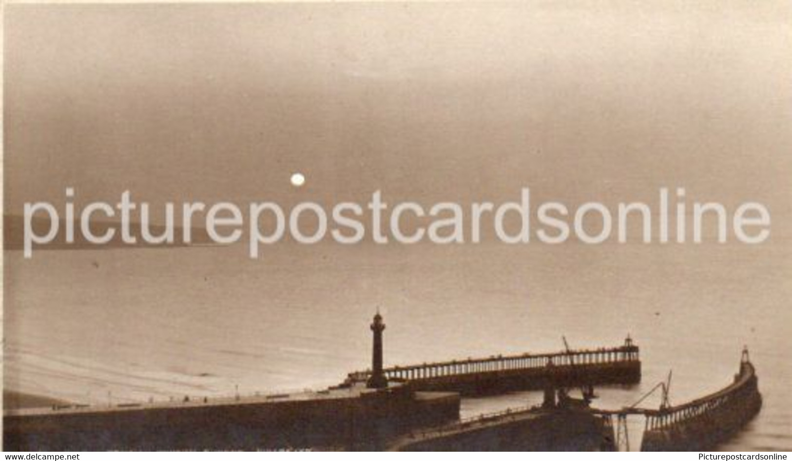 PIER EXTENSION WHITBY SUNSET OLD R/P POSTCARD YORKSHIRE BY JUDGES - Whitby