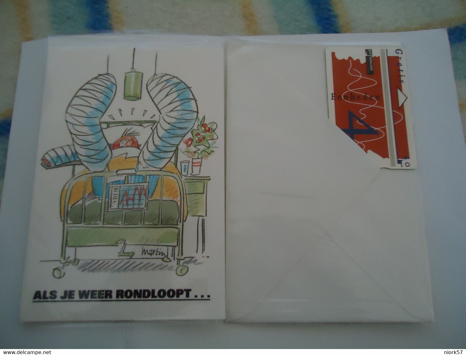 NETHERLANDS MINT PHONECARDS  IN FOLDER 4 COMICS CARDS AND ENVELOP - Other & Unclassified