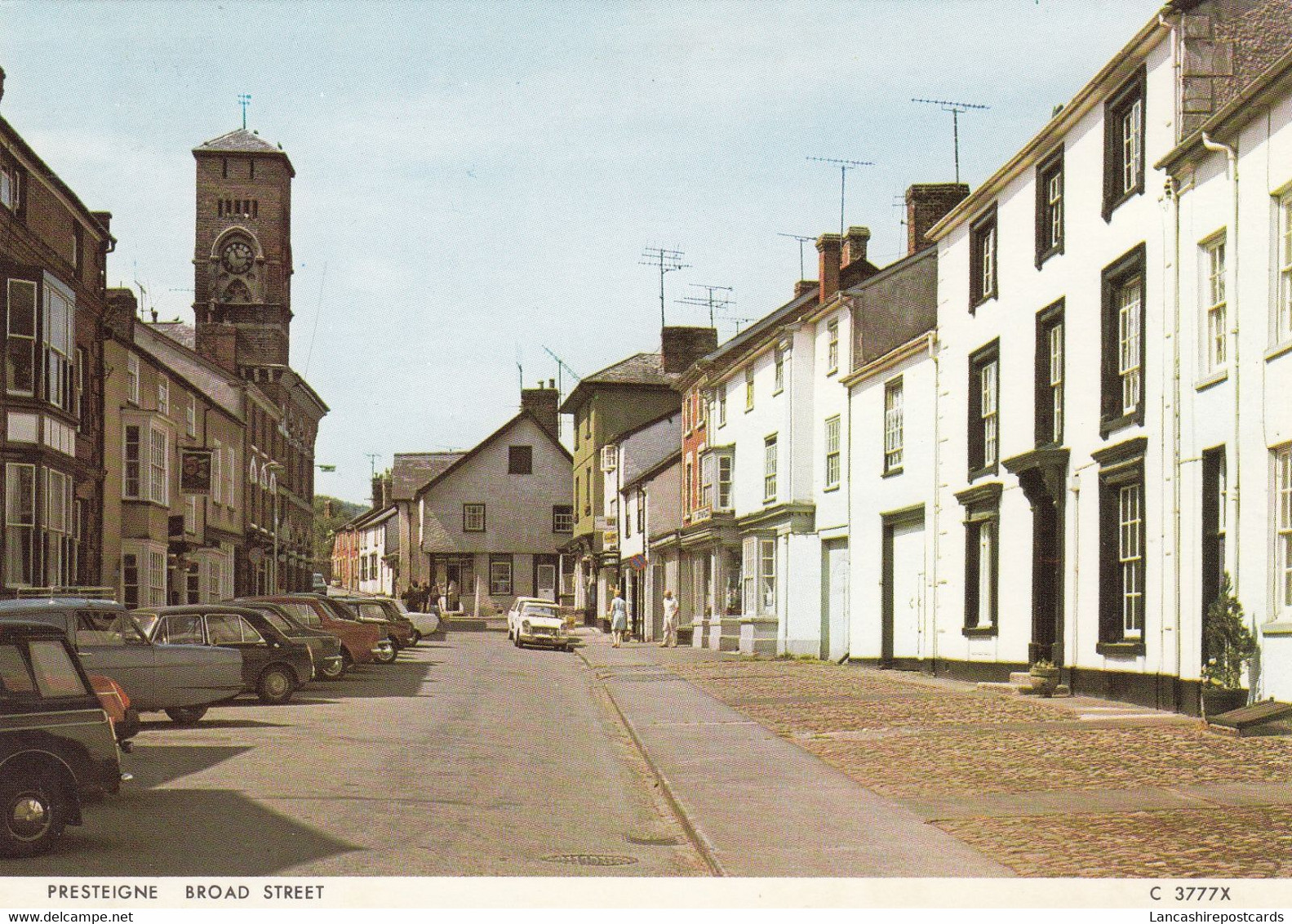 Postcard Broad Street Presteigne [ Clock Tower Reliant Robin Triumph Herald ? & Old Cars ] My Ref B26093 - Radnorshire