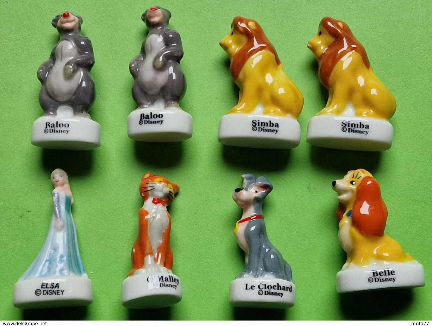 Lot 8 Fèves DISNEY - Porcelaine - Ours Lion Chien Chat - Vers 1980 / 2010 - Disney