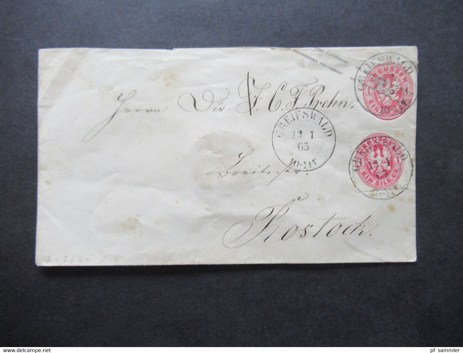 AD Preußen 1865 Ganzsachen Umschlag 1 Silbergroschen Mit Zusatzfrankatur Stempel K2 Greifswald Nach Rostock Gesendet - Postwaardestukken