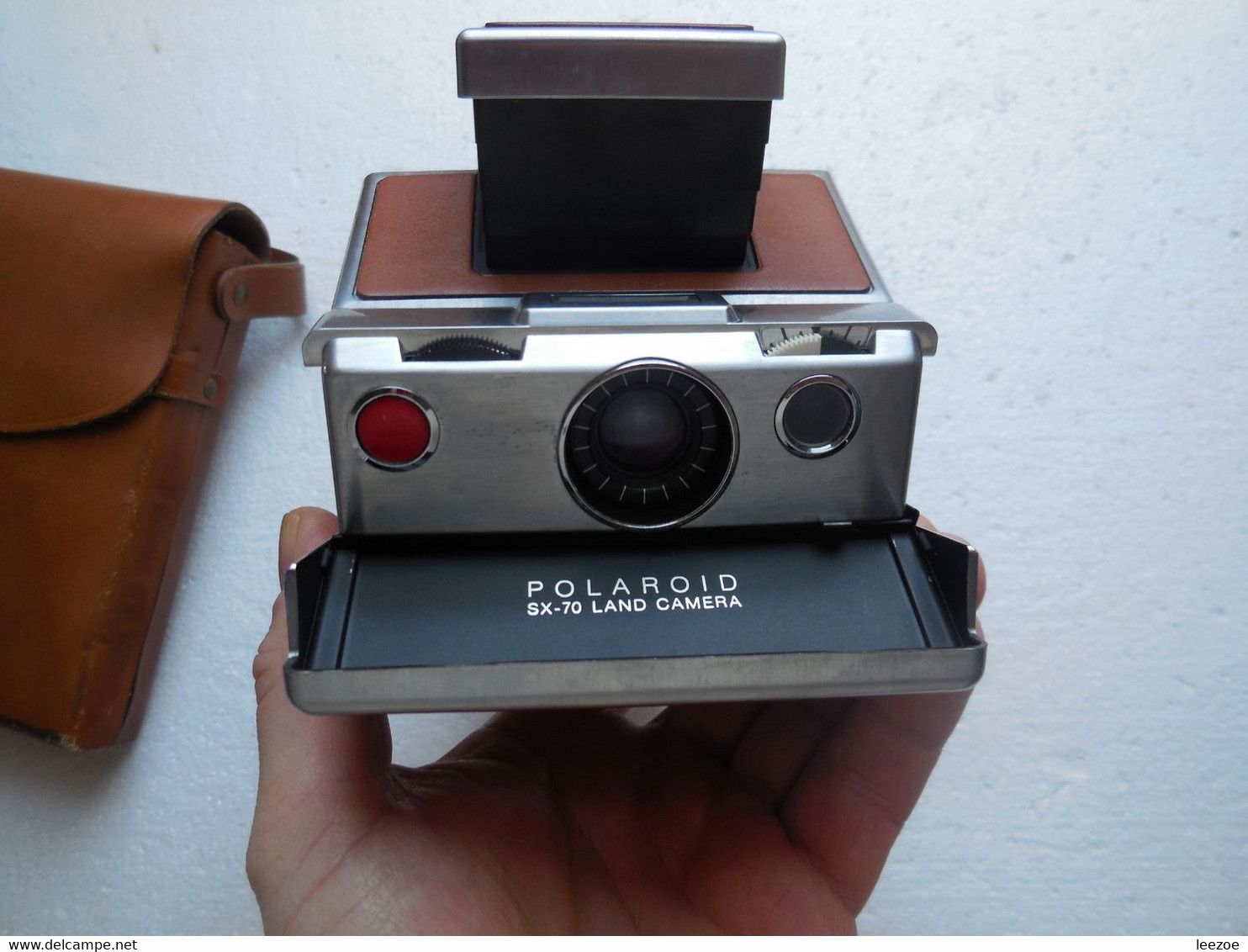 POLAROID REFLEX SX-70 DE LUXE LAND CAMERA, testé avec cassette sans film, comptage nickel mécanisme ok..N10.22