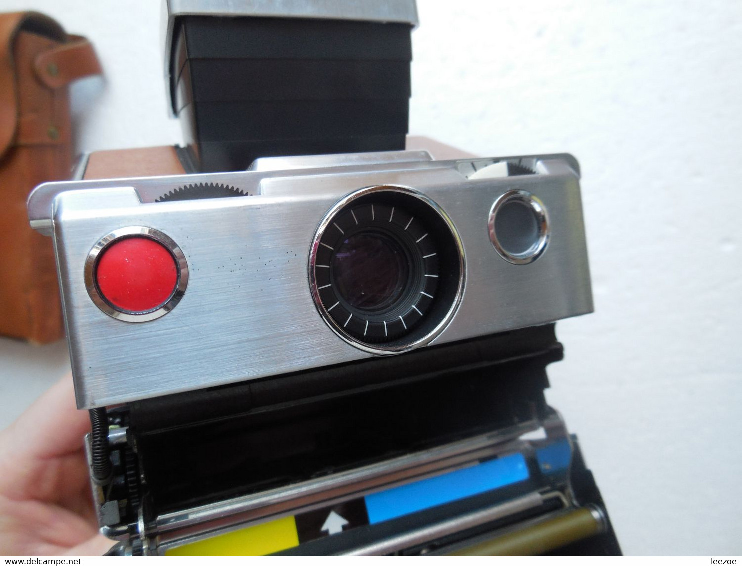 POLAROID REFLEX SX-70 DE LUXE LAND CAMERA, testé avec cassette sans film, comptage nickel mécanisme ok..N10.22