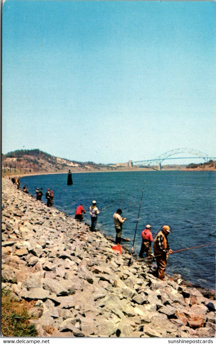 Massachusetts Cape Cod Fishing For Striped Bass Along The Canal - Cape Cod