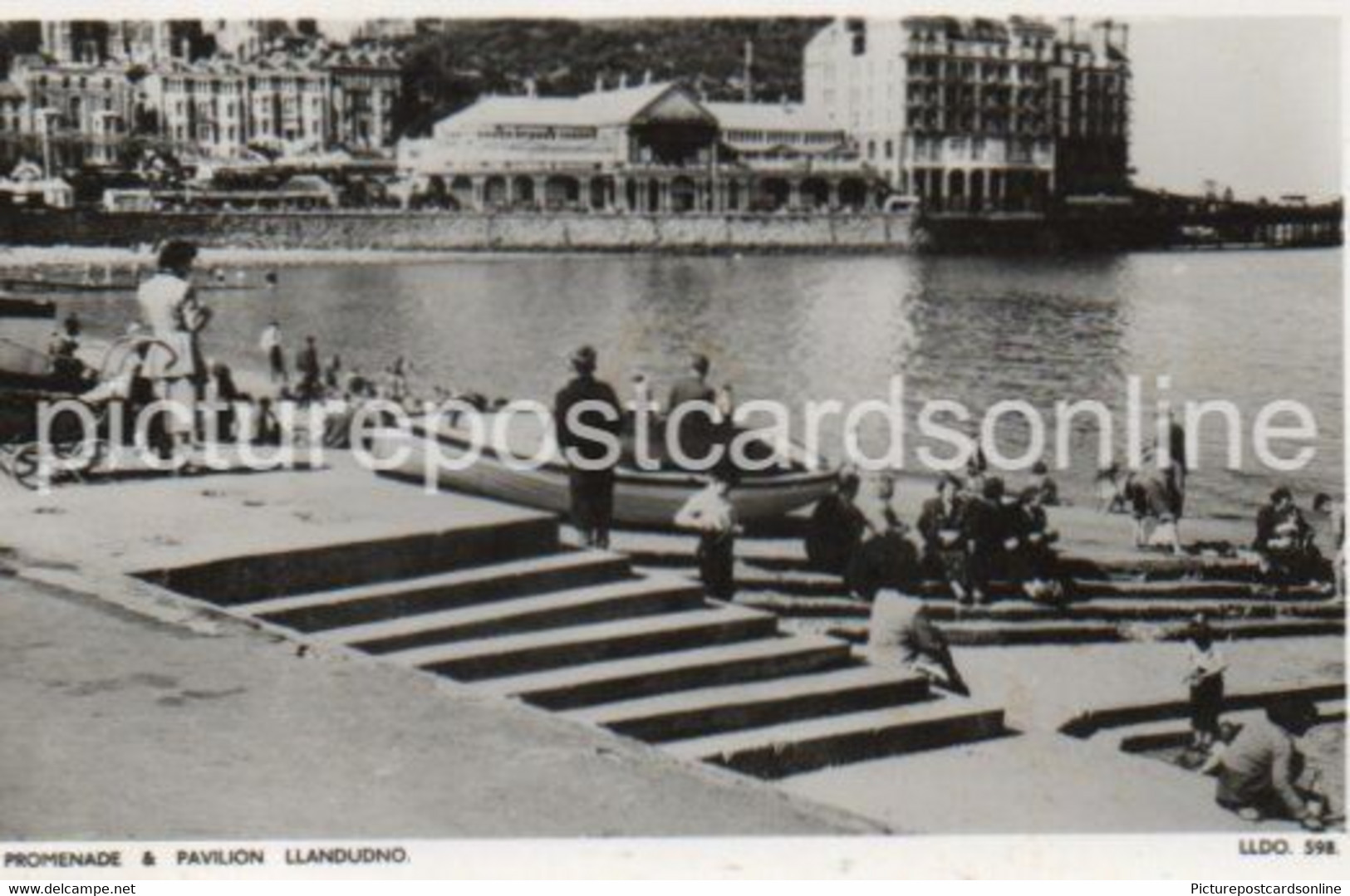 LLANDUDNO PROMENADE AND PAVILION OLD R/P POSTCARD WALES - Denbighshire